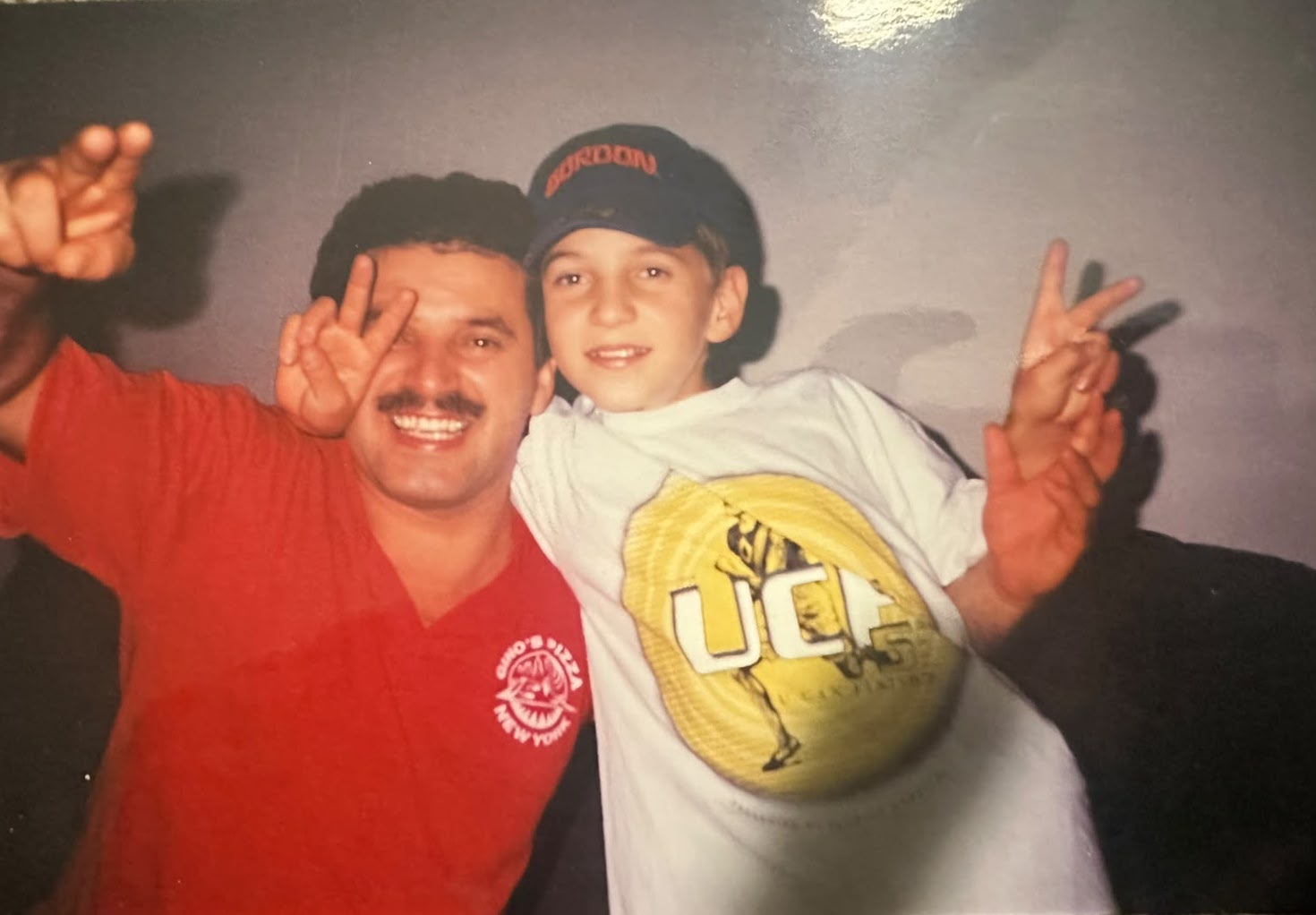 A young Mondi Markeci with his father in the family restaurant